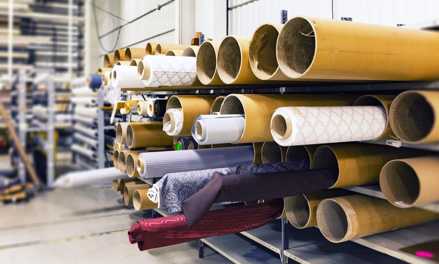 Rows of textile rolls in storage