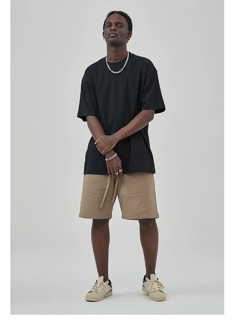 Black oversized cotton T-shirt finished sample, relaxed on-body view